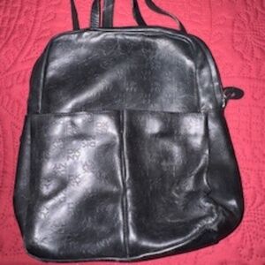 DKNY black leather backpack  great condition.